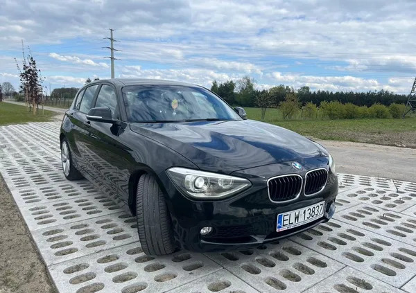 rzgów BMW Seria 1 cena 33900 przebieg: 306000, rok produkcji 2012 z Rzgów